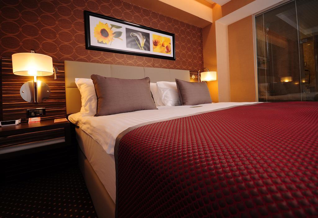 Hotel Ramada Plaza By Wyndham Izmit Kocaeli Zewnętrze zdjęcie A bedroom